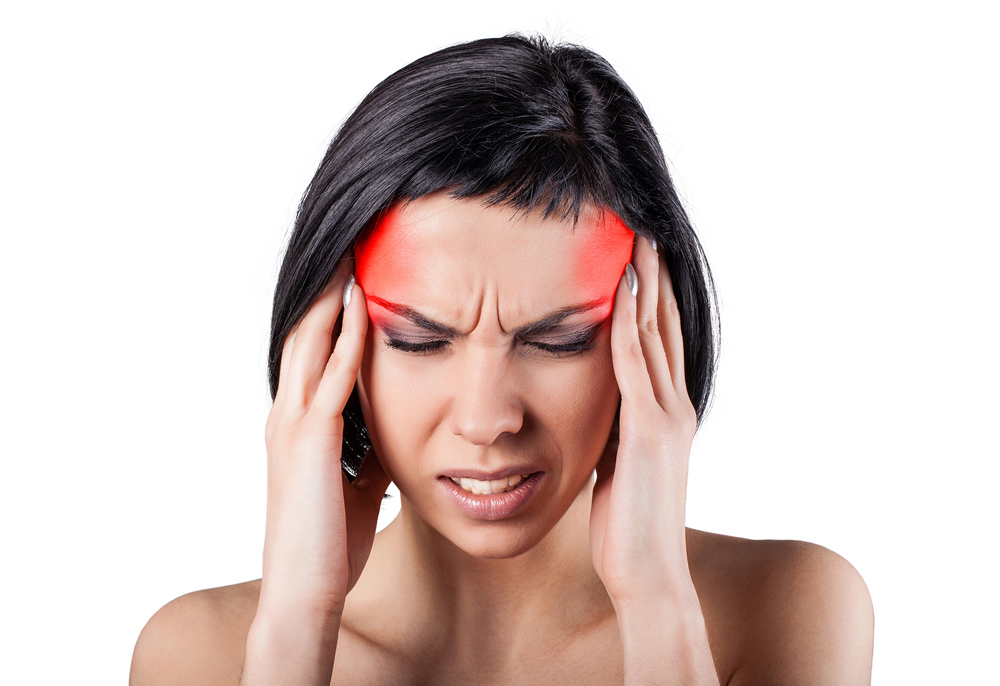 woman suffering from a painful headache